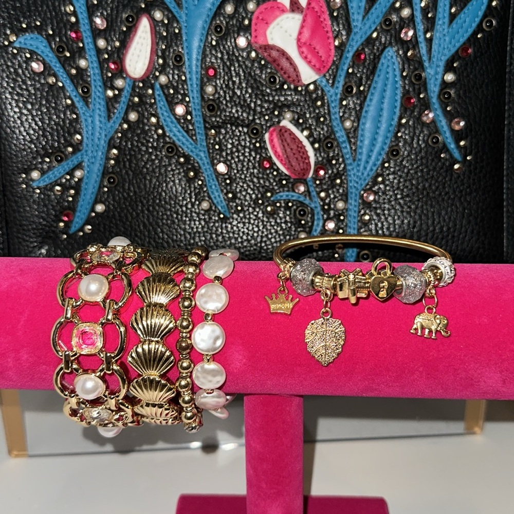 Elegant Gold and Silver Charm Bracelet